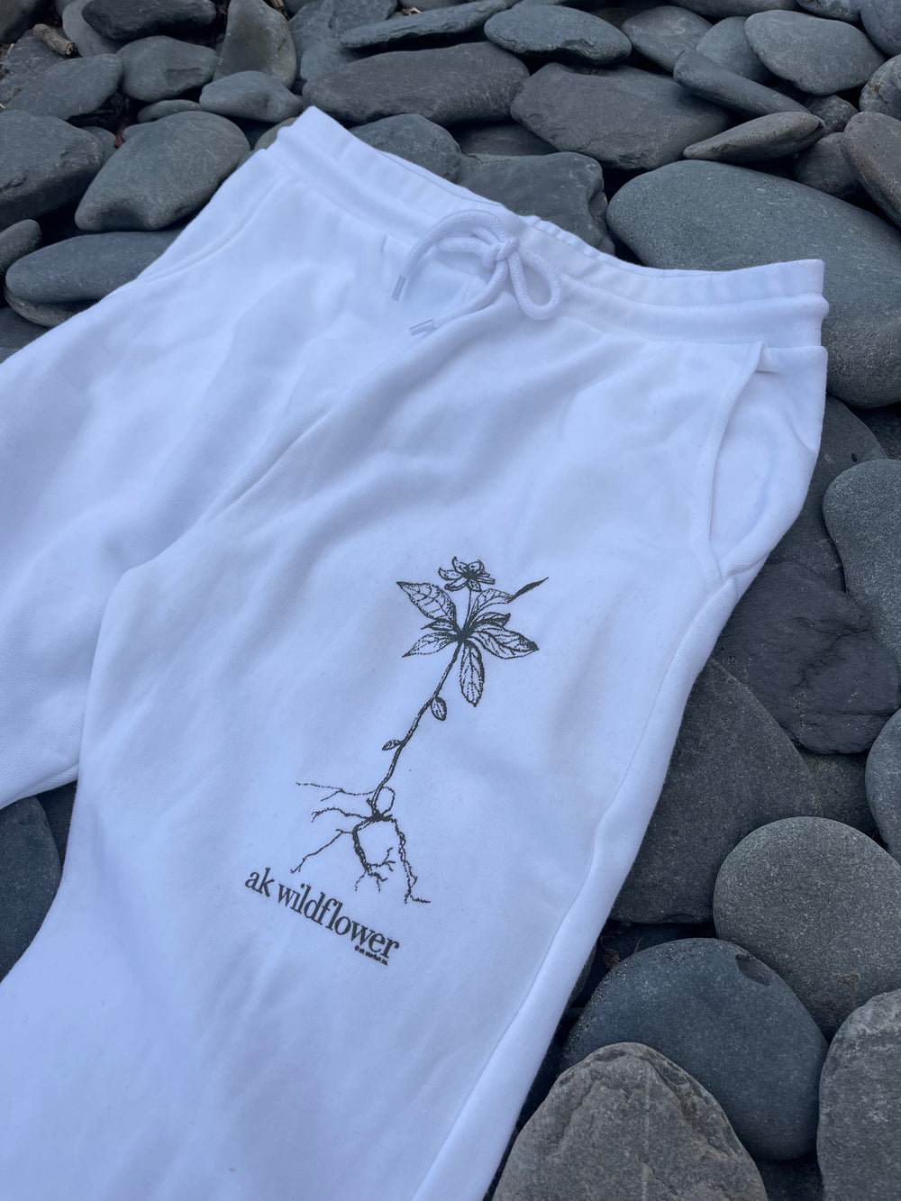 White 50/50 AK Wildflower Joggers. $68.00