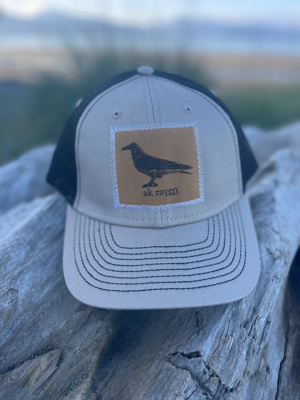 Driftwood / Black AK Raven Patch Hat. $38.00