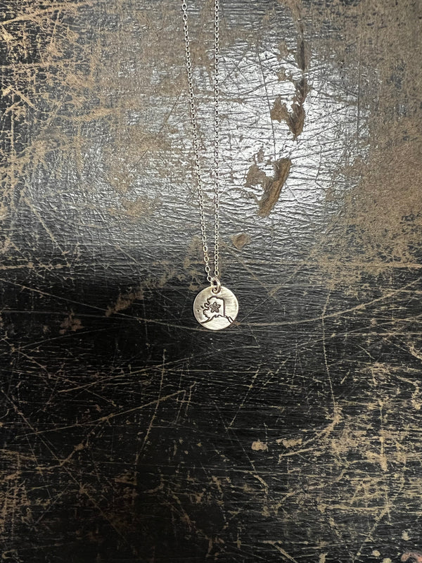Circle Pendant with Alaska Shape and Forget Me Not $49.00