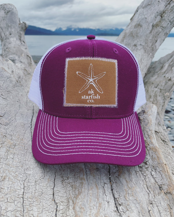 Violet / White AK Starfish Co. Patch Hat. $38.00